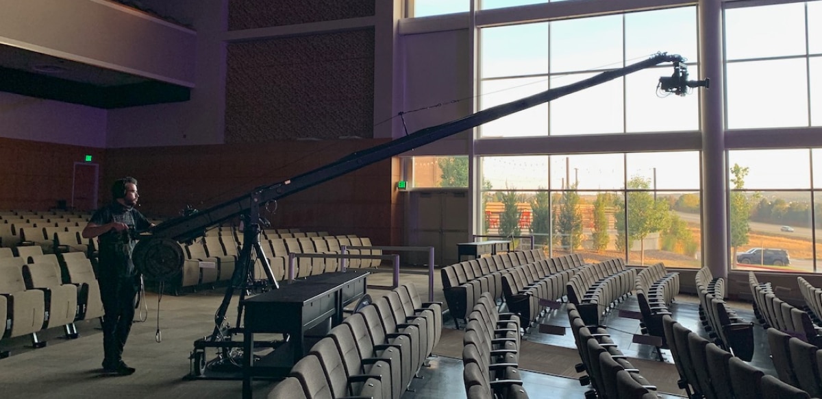 System camera on a crane in an empty auditorium