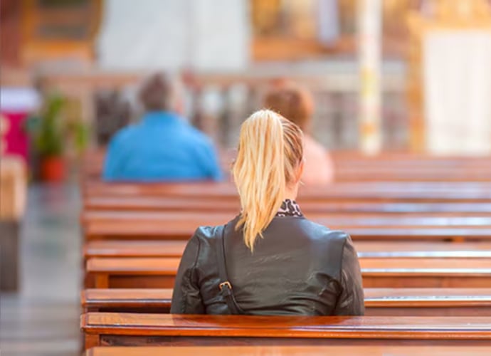 People sitting on church pews