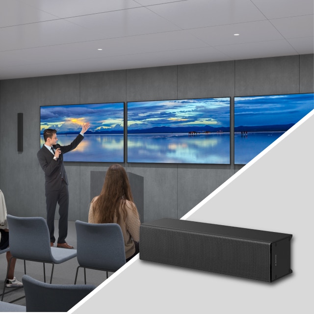 Bravia displays and powered line array speaker in the lecture room and the speaker image at the corner.