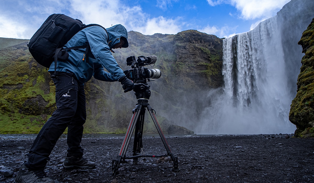 Paolo Sodi with camcorder using tripod