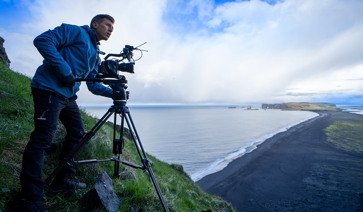 Paolo Sodi with camcorder using tripod