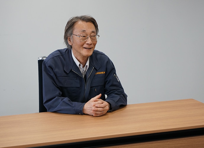 Nara Man at desk