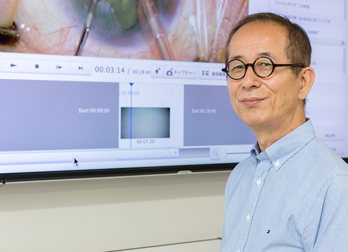 Fujita Eye Clinic man looking at screen