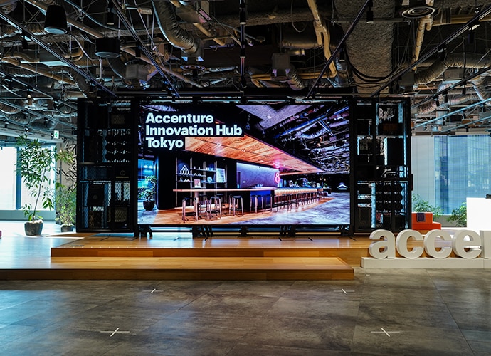 Crystal LED screen display with “Accenture Innovation Hub” text and bright images