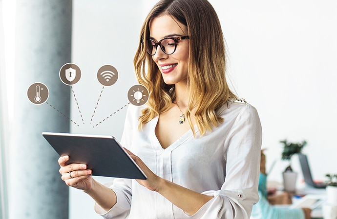 Woman using TEOS Cloud on a tablet