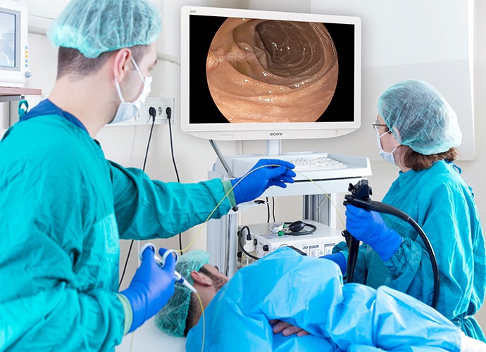 Surgeons check sony medical display during an endoscopic procedure