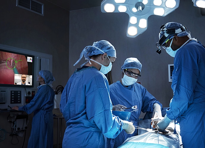 surgeons performing a surgery use NUCLeUS platform to consult with fellow surgeon