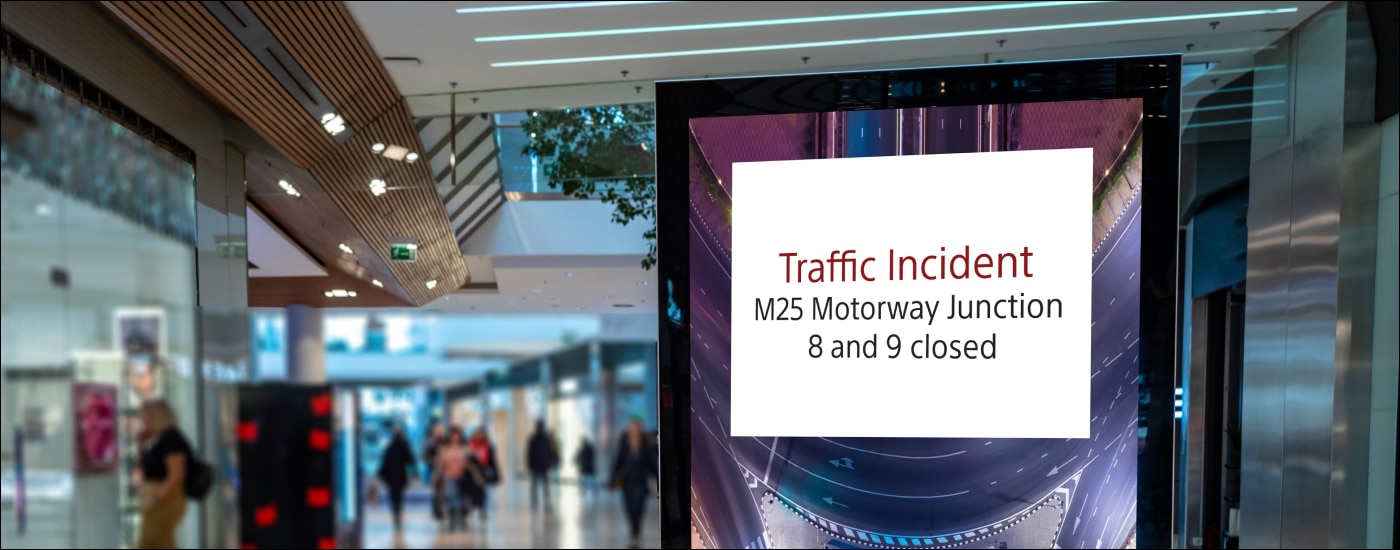 Vertical display with traffic incident alert in shopping mall