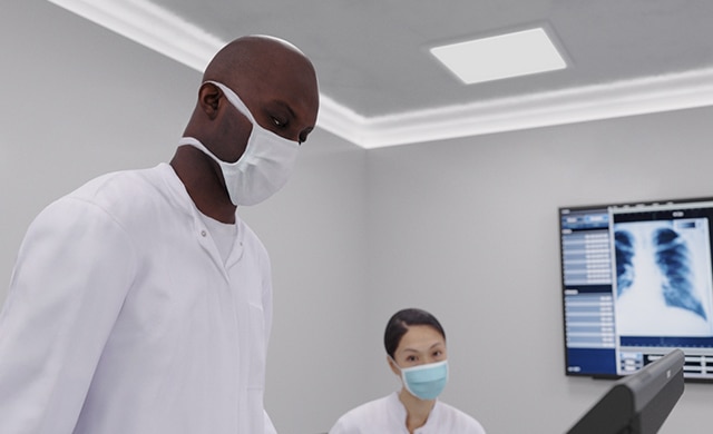 Image of SR2 in a medical environment with medic looking at the screen