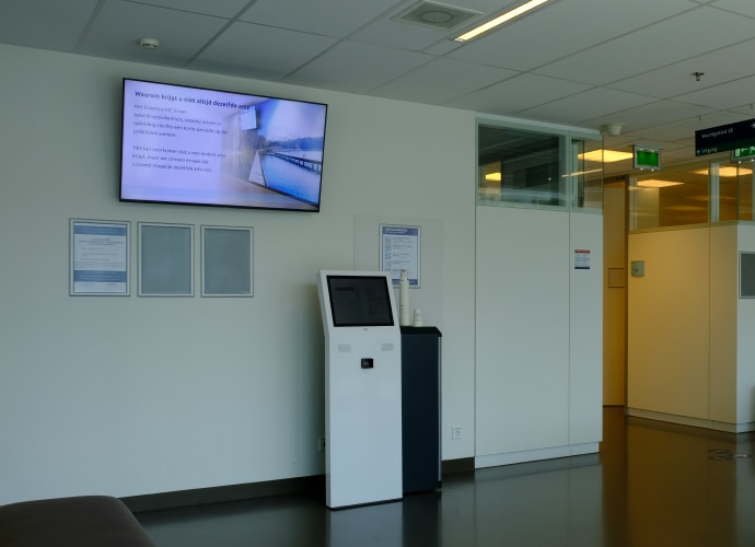 Digital screen signage in hospital corridor