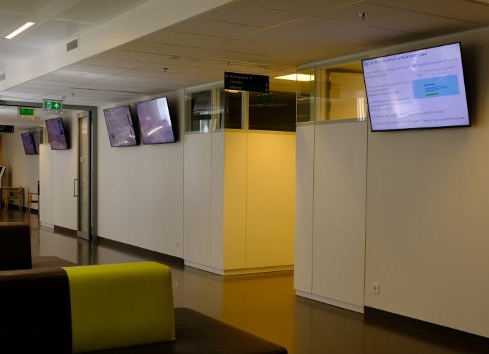 Bravia screens displaying patient information in waiting area