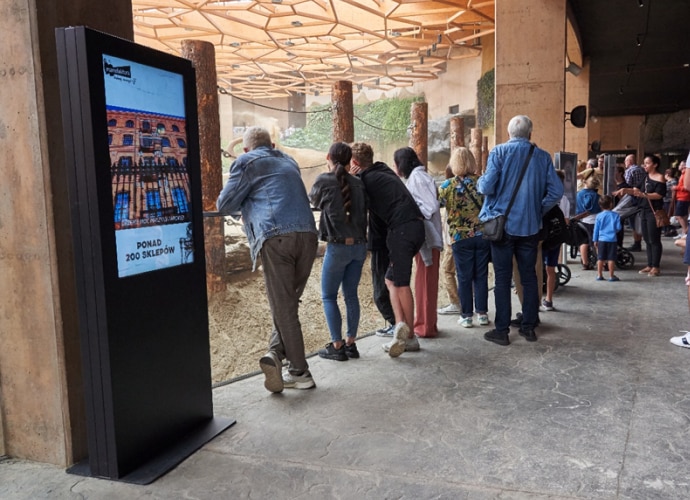 Information display screen next to animal enclosure