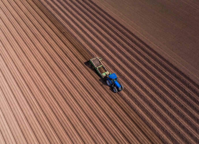 A tractor working on a field