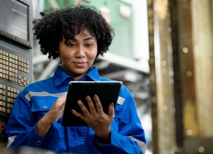 A woman holding a tablet