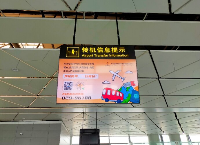 Ceiling mounted display screen in airport lounge