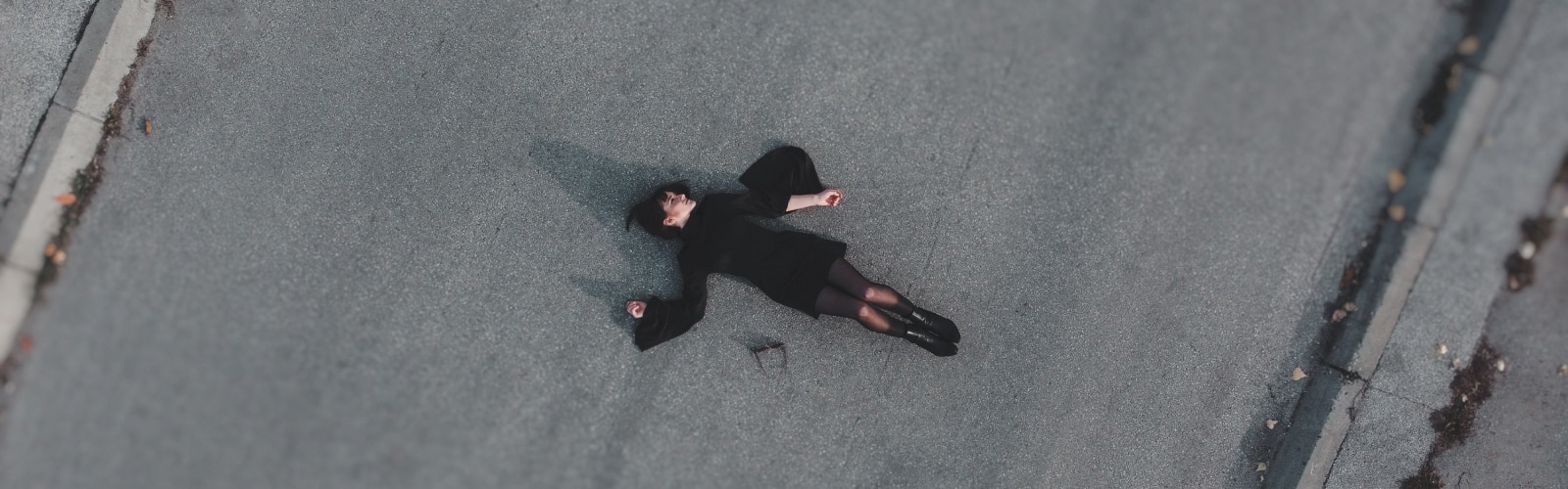 Aerial view of a person lying on the floor.