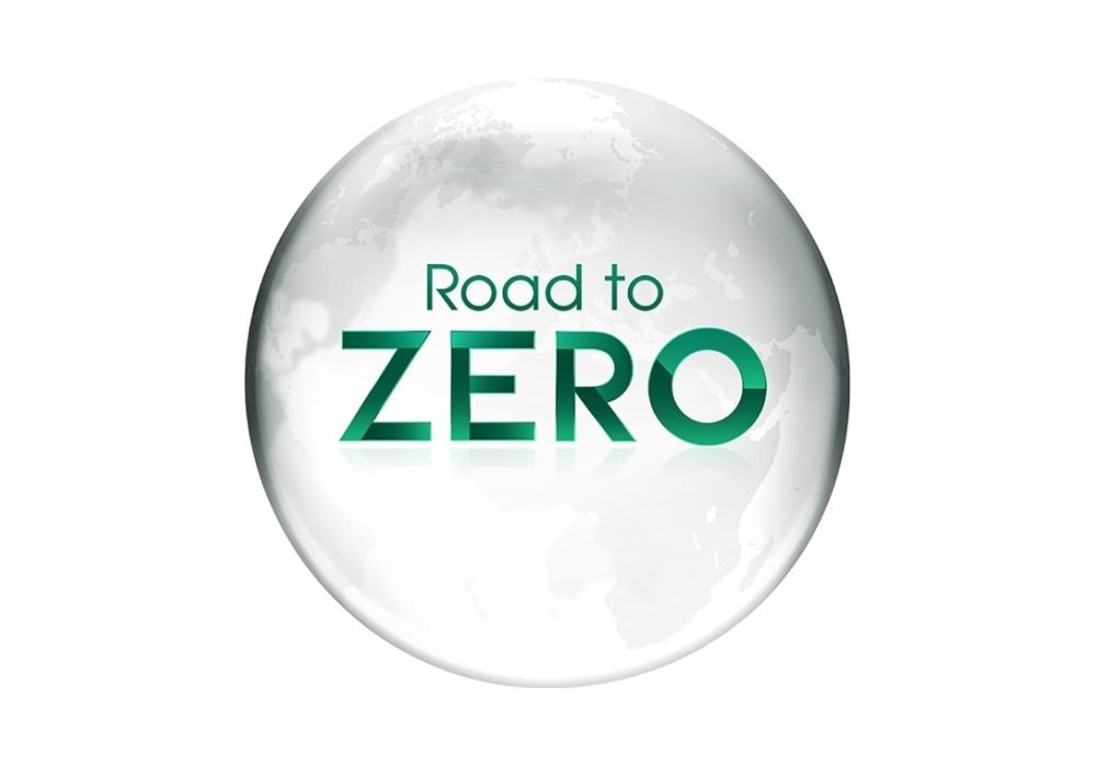 A globe with the green title in the middle “road to zero“