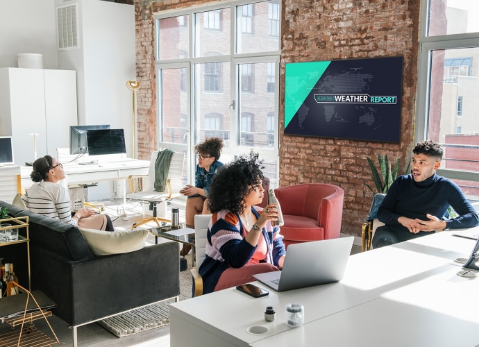 Coworking space with information display screen on the wall