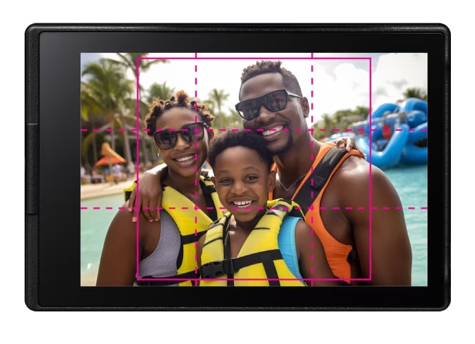 A family of three taking a photo at a water park