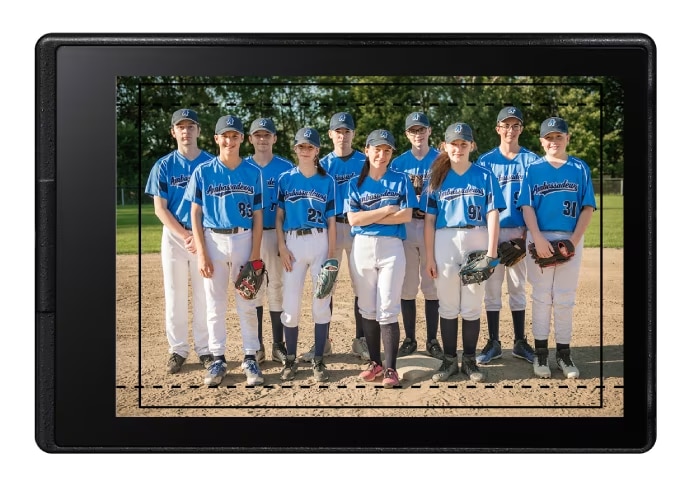 Baseball sports team posing for a group photo