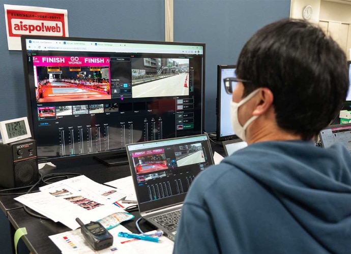 A man looking at the screen