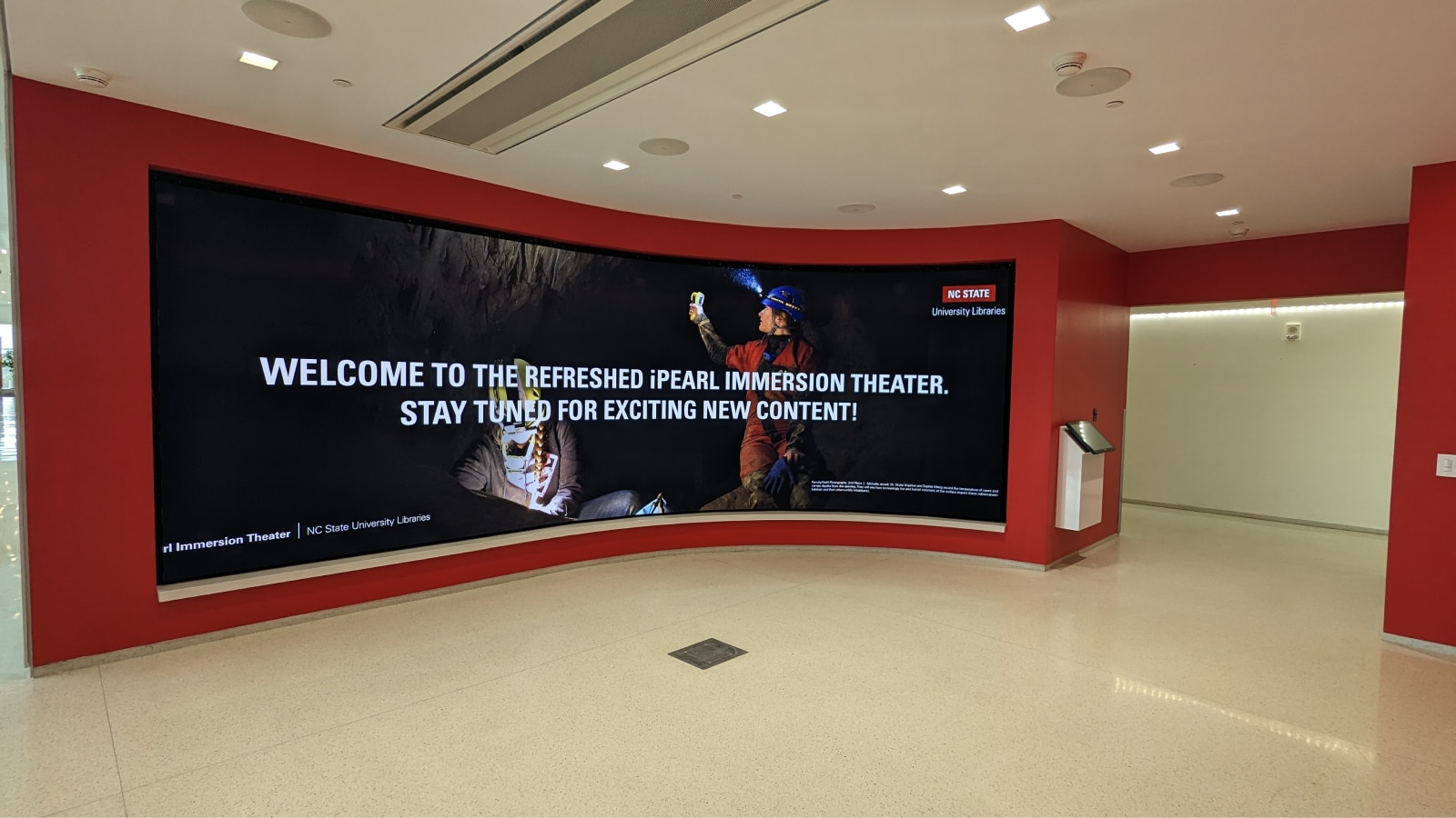 Library entrance Curved LED wall with welcome text and large HD image display