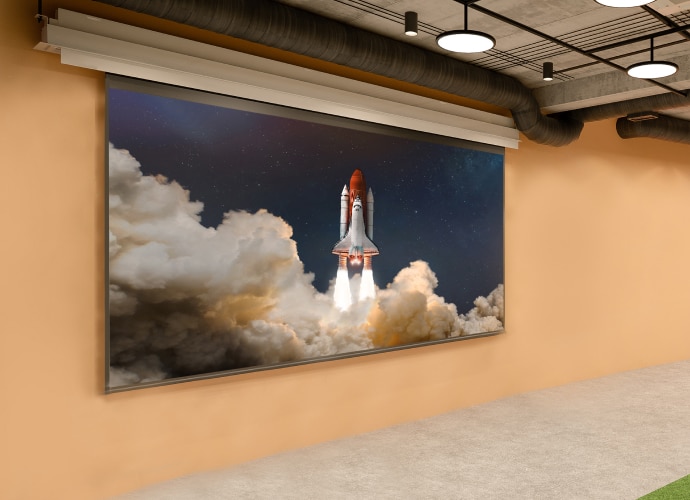 A university hall with a BRAVIA display on the wall that shows a rocket launch