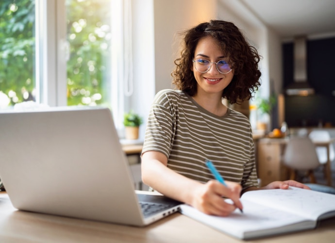 A student using a laptop for flexy studying