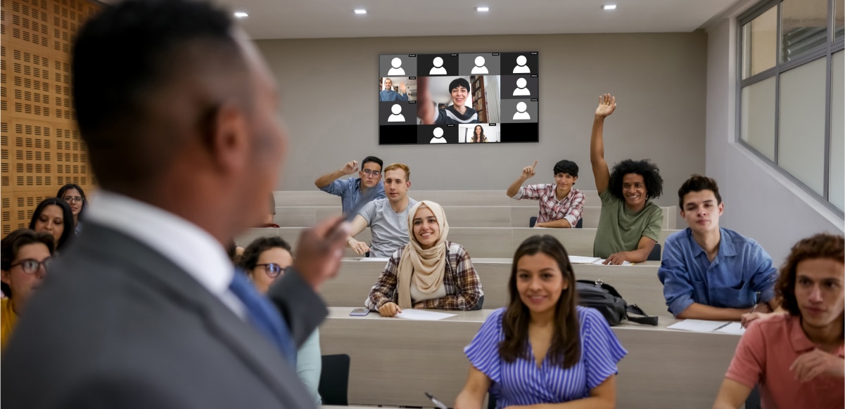 A classroom with in-person and online students on a BRAVIA display