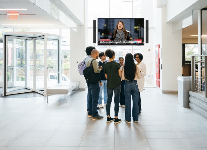 A spacious university lobby with Bravia display