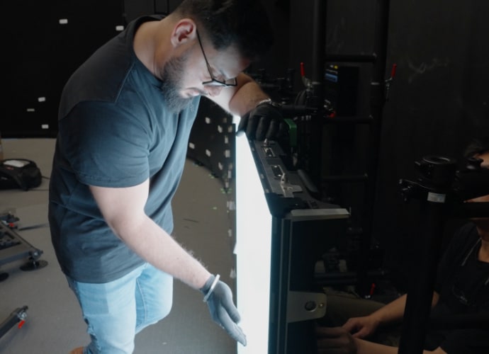 Technician with a Crystal LED panel